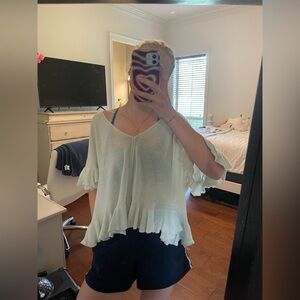 Oversized V-neck ruffle top